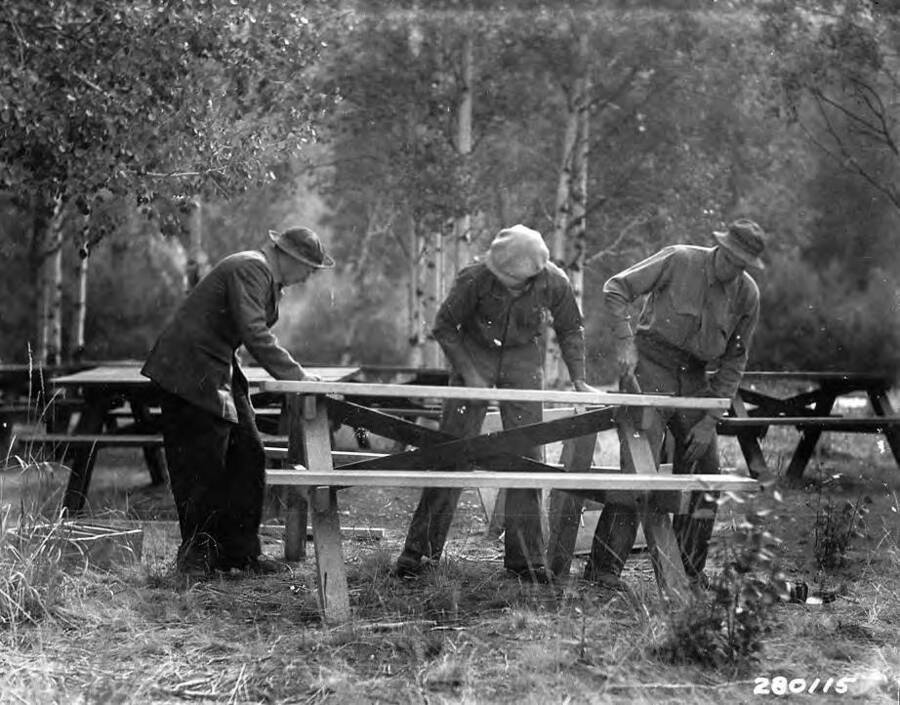 Three men build campground tables at Camp Ketchum, Sawtooth National Forest, Idaho.