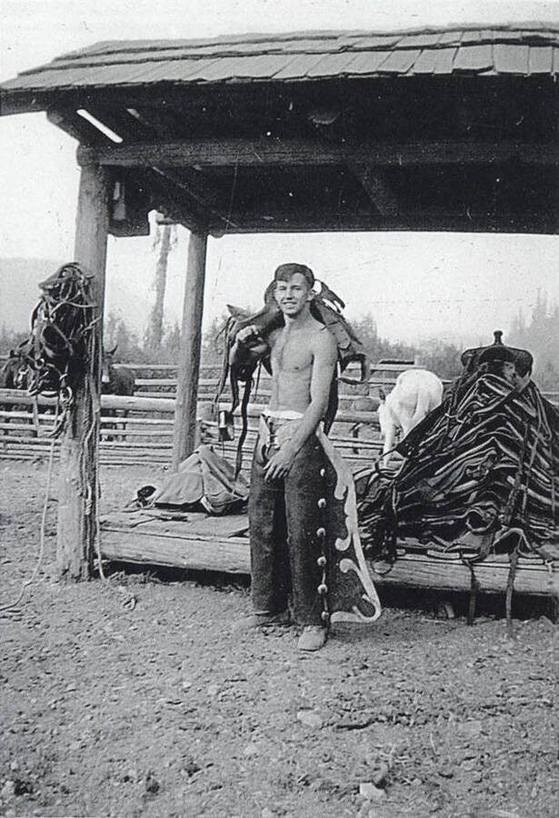 Kenneth Preston with horse gear in the Magee District.