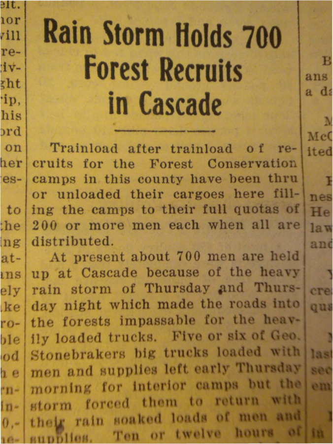 Article about the arrival of 200 Forest Conservation camp recruits and the 700 recruits who were held up in Cascade due to a rain storm.