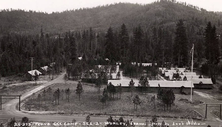 A view of Worley CCC Camp. Also known as Peone. Writing on the photo reads: 'Peone CCC Camp SCS-2 Worley, Idaho photo by Leo's studio'.