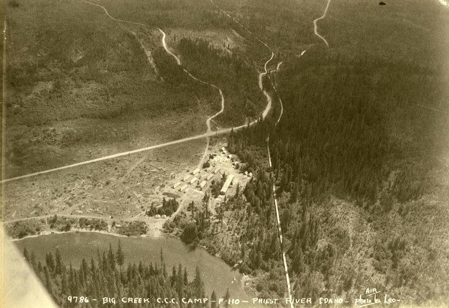 Aerial view of Big Creek CCC Camp. Writing on the photo reads: 'Big Creek CCC Camp F-110 Priest river Idaho Air photo by Leo'.