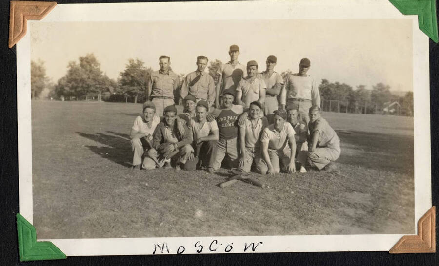 Baseball team, captioned 'Moscow.' Man in center is wearing a Ward Paint and Hardware shirt, a local business. From the Paul Saft photographic album, SCS-1, C-1503, 1938-39, Moscow, Idaho, depicting camp life, taken mostly in the Moscow, Lewiston and Robinson Lake area, 1938-19