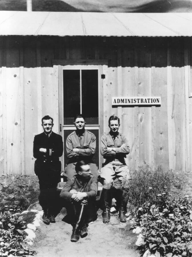 Formal group portrait of administrators in front of the Administration building, Ketchum, Sawtooth National Forest