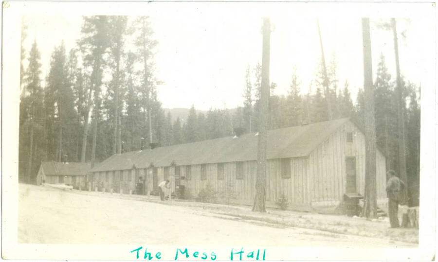 Picture of wooden building from photo album. Handwritten at bottom: 'The Mess Hall'.  This is likely to be located at Camp Creek, South Fork of the Salmon River, which built Krassel Ranger Station.