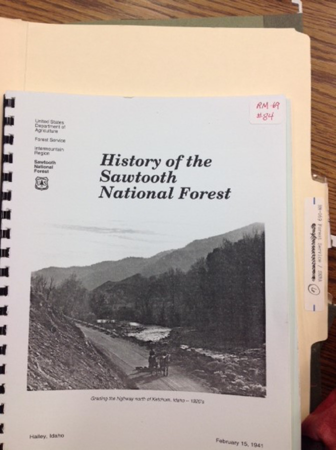 Cover and three  pages related to the CCC. In History of the Sawtooth National Forest, Febr. 15, 1941.