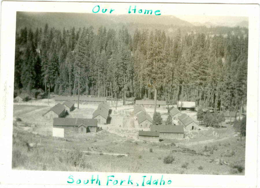 View of camp with caption 'Our Home' 'South Fork, Idaho'.  This is likely to be located at Camp Creek, South Fork of the Salmon River, which built Krassel Ranger Station.