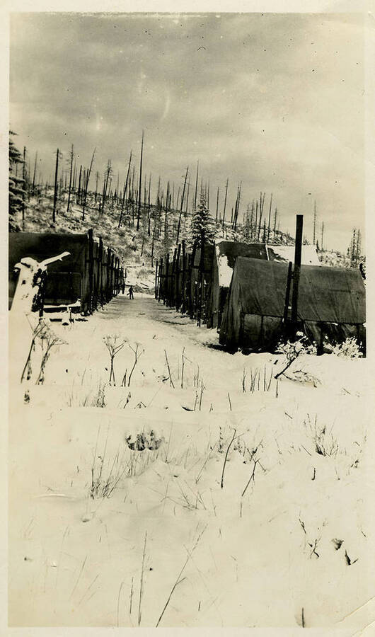 A side view of the Camp North Fork. Back of photograph reads, "Side camp–First Mt. Snow in Idaho Sept."