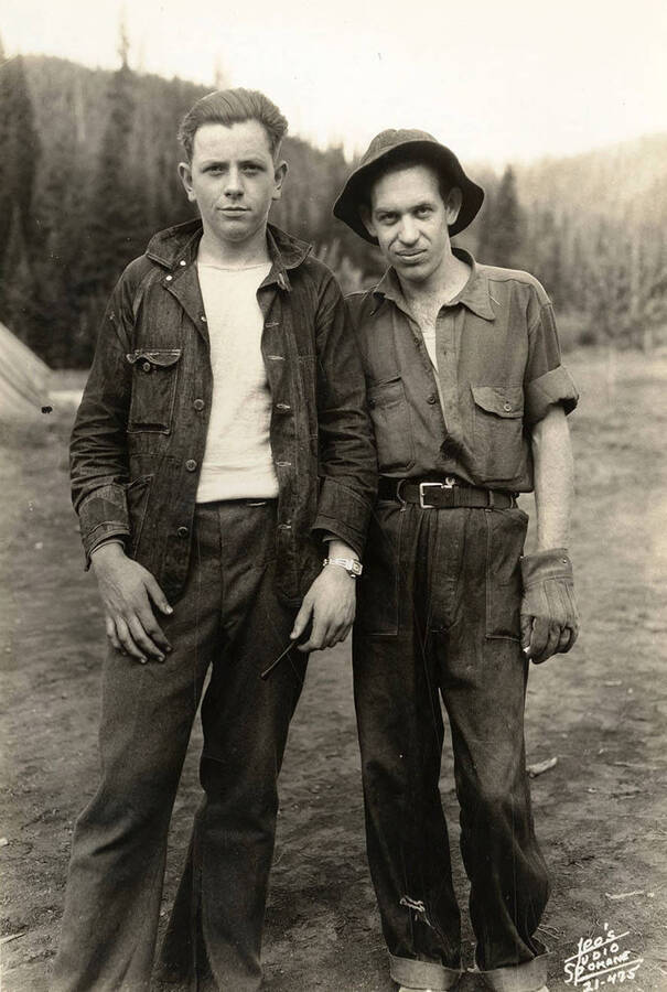 Group portrait of two CCC men at Horse Heaven CCC Camp. Writing on the photo reads 'Leo's Studio Spokane'.