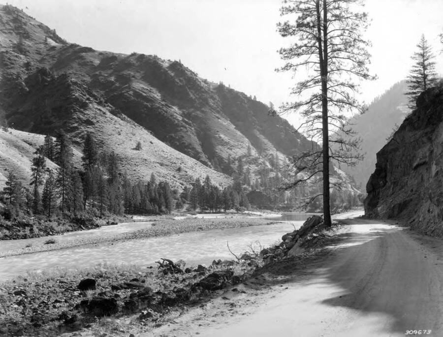 A scenic spot on the road built on the Salmon River by the CCC men in 1934. The writing on the photo reads: '309673'.