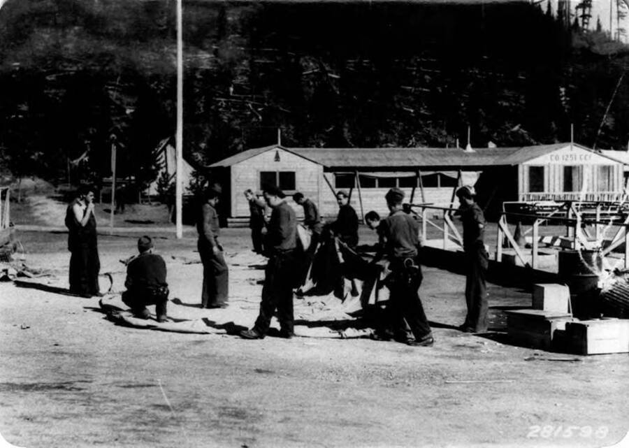 CCC men dismantling Camp Packer Meadows, in the Lolo National Forest, Aug. 1933.