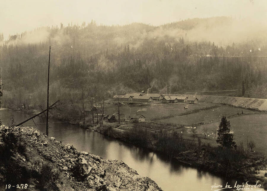 View of Pheniff, or Funnif, CCC Camp, F-119, and it's surroundings. Writing on the photo reads: 'photo by Leo's Studio Spokane'. Back of photo reads: Pheniff'.