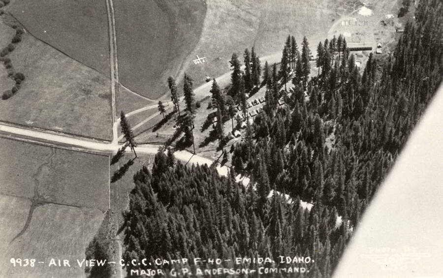 Aerial view of CCC Camp Santa Creek, F-40, near Emida, Idaho. Geoglyph in the field reads: 'F-40'. Writing on the photo reads: 'CCC Camp F-40 Emida, Idaho. Major G.P. Anderson Command Photo by Leo'.