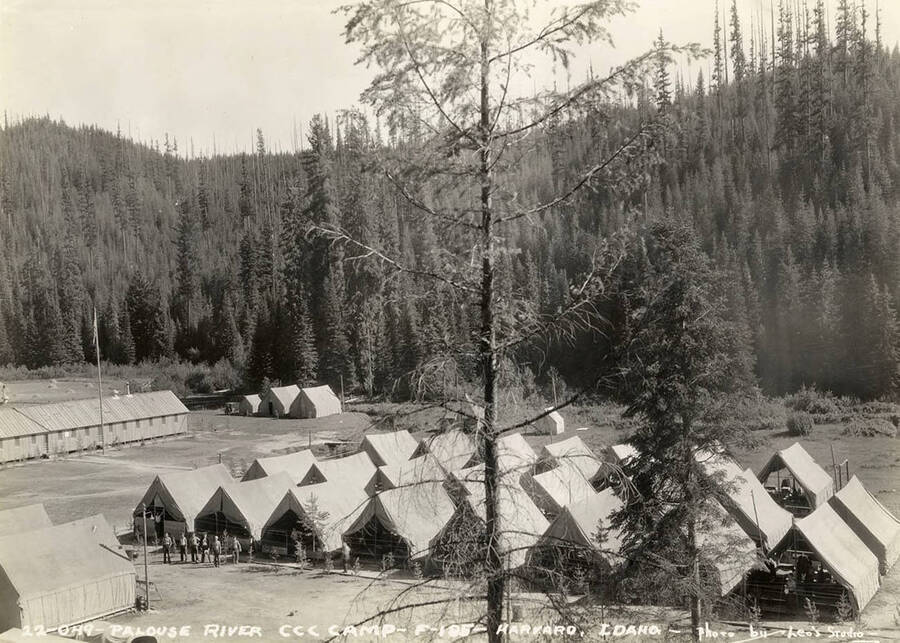 View of Palouse River CCC Camp, F-185. Writing on the photo reads: 'Palouse River CCC Camp F-185 Harvard, Idaho photo by Leo's Studio'.