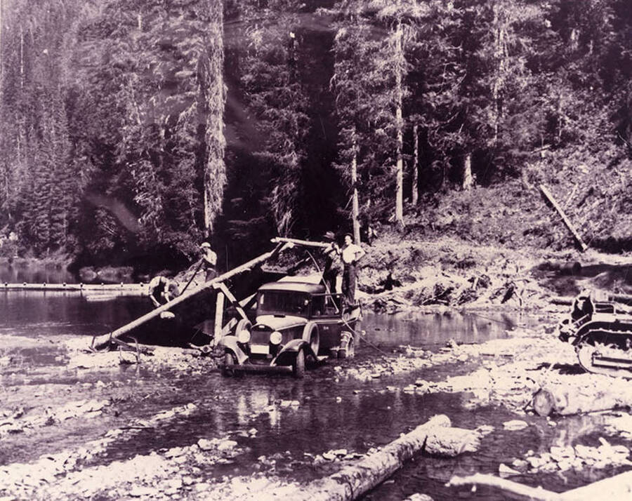 CCC men loading gravel onto a truck for the Sissons Bridge in the Coeur d'Alene National Forest.