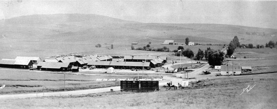 View of CCC Camp SCS-1 near Moscow, Idaho. Writing on photo reads: 'CCC Company 1503 Camp SCS-1 Moscow, Idaho. Writing on back reads: -6-257 CCC Camp April 1933 on Lewiston Highway S. of Moscow later the Plantation and Chinese Village see 1-6-260, 258 1-1-99'.