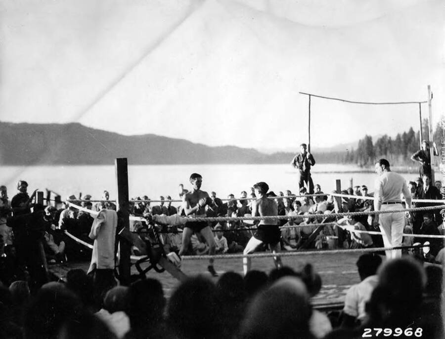 A boxing match at the CCC Carnival in McCall, Idaho. 'Boxing wound up the day's sports at the CCC Carnival in McCall, Idaho - 3 camps competing.'