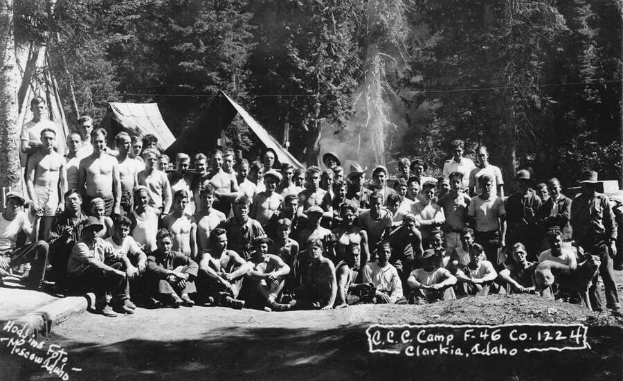 Group portrait of Company 1224 posing at Camp F-46 near Clarkia, Idaho.