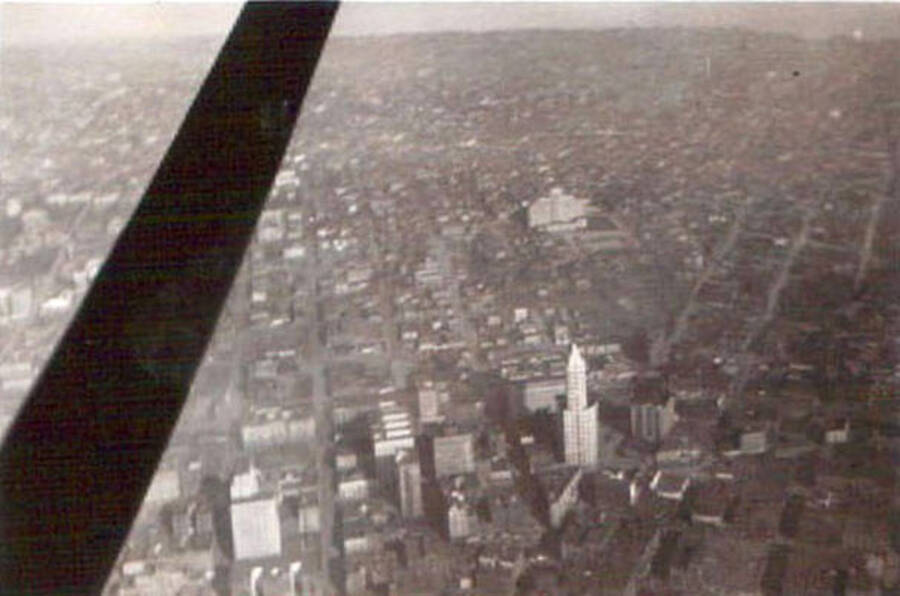 View of Seattle from above. Writing under the photo reads: 'Seattle Washington'.