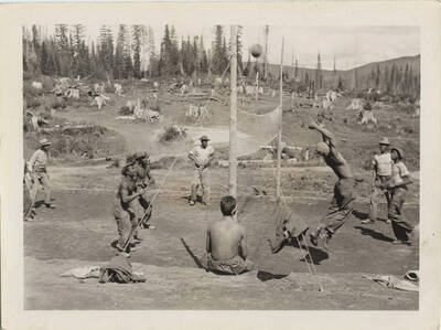 A group of enrollees play volleyball at Camp Prichard.