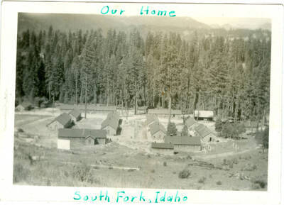 View of camp with caption 'Our Home' 'South Fork, Idaho'