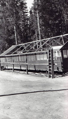 Getting ready to put tarp roof on spike camp building.