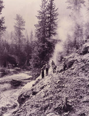 CCC Crew posed at the worksite for the pier at Sissons Bridge. Back of photo reads: 'Jackhammer work in prep for bridge Pier at Sissons Ambrose 1933'.