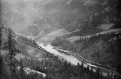 Birds-eye view of a river and surrounding area.