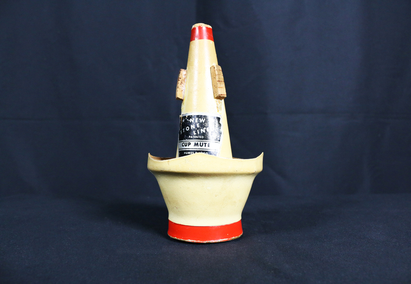 Red and cream colored New Stone Line patented cup mute.