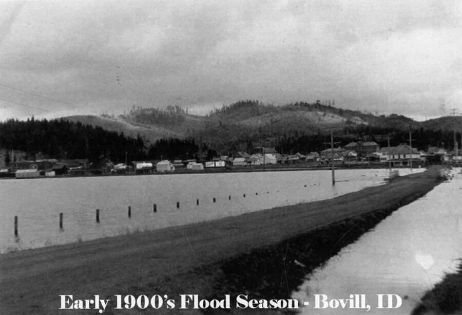 View of flooding during flood season, with mountains in the distant.