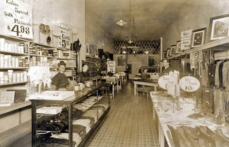 Andrews Store. Interior view showing Mildred Dodge and Mr. & Mrs. Andrews. Moscow, Idaho.