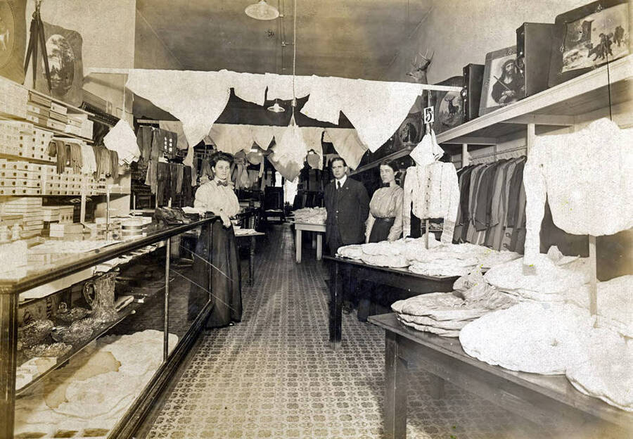 Andrews Store. Interior view showing Mildred Dodge and Mr. & Mrs. Andrews. Moscow, Idaho.