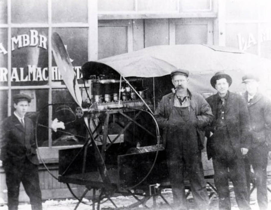 Man with pipe-Thomas Lamb, machinist who built the aerosleigh, to his left-Daniel E. Riley, the inventor of the aerosleigh
