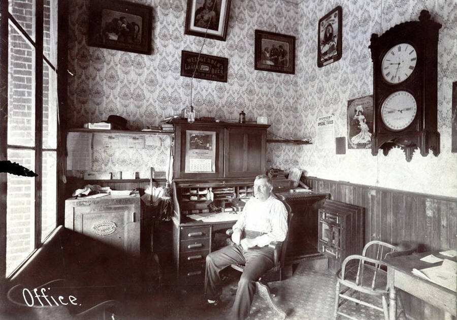 Christ Weisgerber sitting in his office. C. Weisgerber Brewery. Lewiston, Idaho.