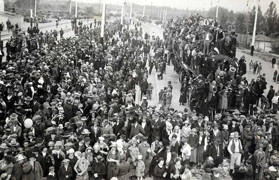 Crowd greeting train. Celebration of coming of Union Pacific main line to Boise. Boise, Idaho.