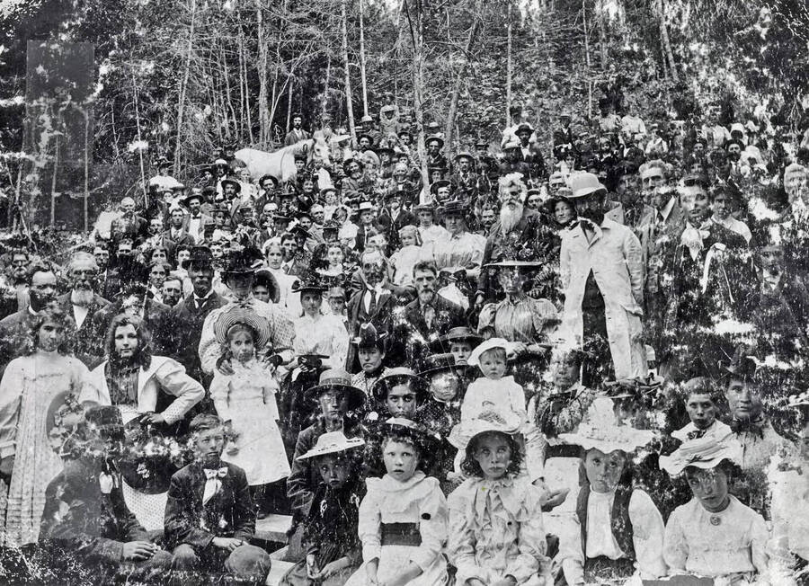 Group of people posed together in the woods. Grangeville?, Idaho.