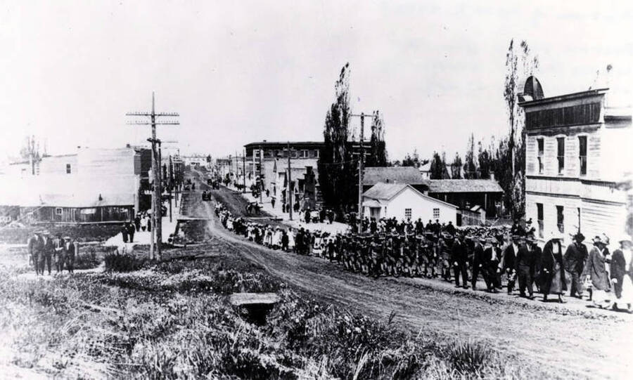 World War I Veterans marching down street. Grangeville, Idaho.