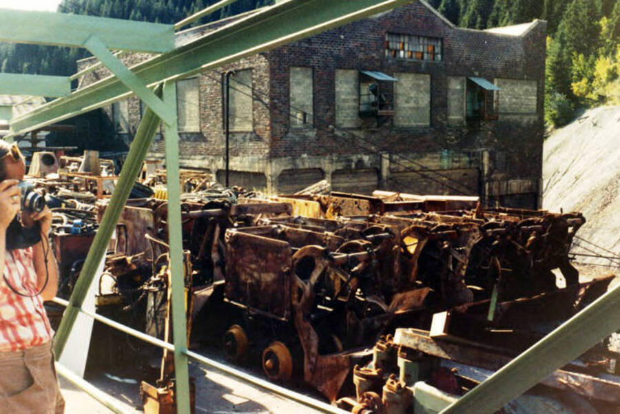 Ore cars brought out preparatory to closing the mine in 1982. Star Mine. Burke, Idaho.