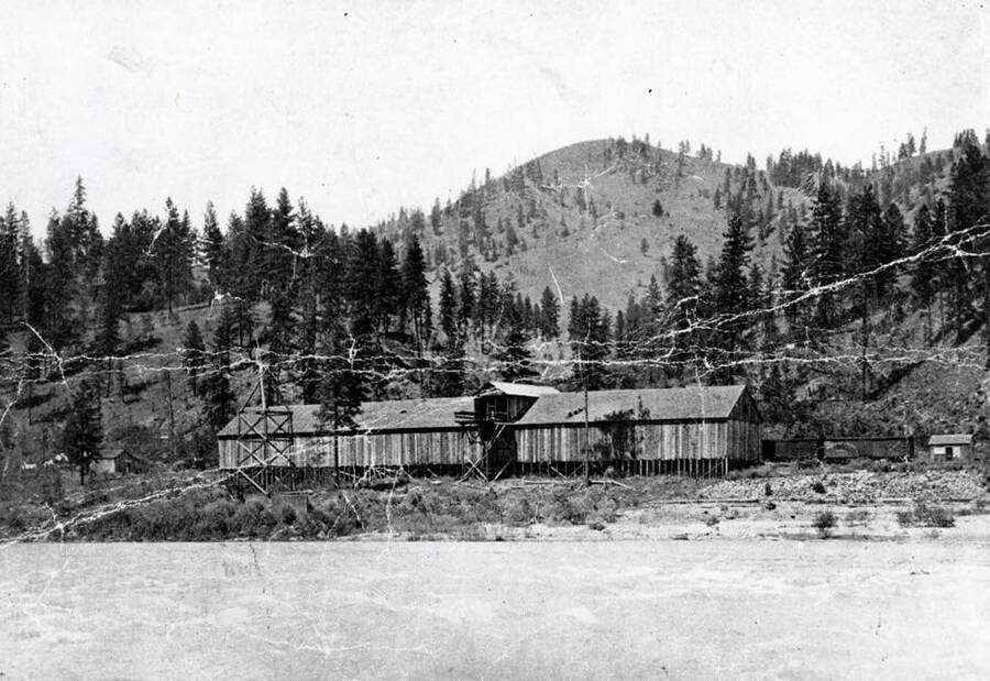 View of Clearwater River, railroad and station looking to the north. Tramway, Idaho.