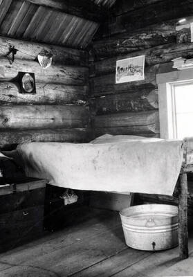 View shows wool sack bed with bear grass filling and washtub