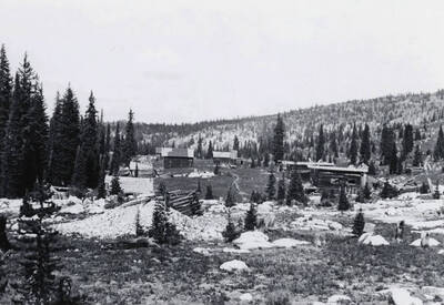 Ghost town. Paddy's Saloon visible behind building in center which is thought to be old post office. Concord, Idaho.