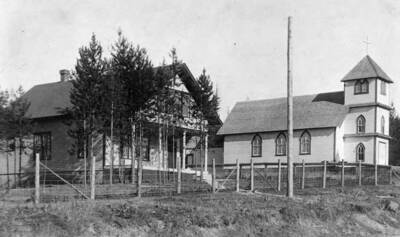 Bovill Catholic Church and a resident's house.