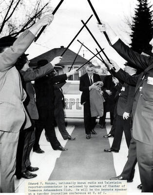 Edward P. Morgan being welcomed by members of Chamber of Commerce Ambassadors Club.