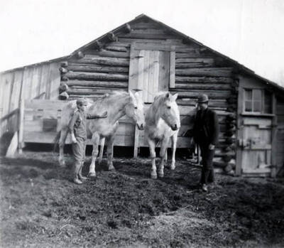 Log portion is part of original log cabin to which Mr. Taylor brought his family in 1871