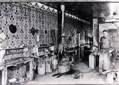 Jonathan Lamb working in the blacksmith shop