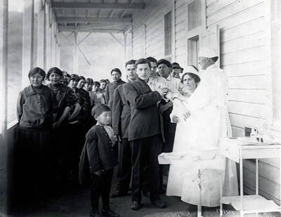 Vaccination time. Fort Lapwai Indian Sanitarium. Idaho.