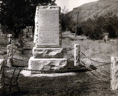 Shows back side of monument