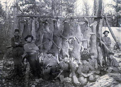 Old-timers in Elk River disagree on identification of men. Taken on either Elk Creek or North Fork of Clearwater