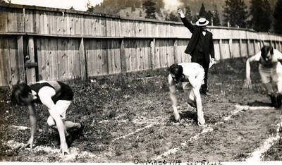 Graf, CHS star springer off with the gun 220 yd. 4th heat winning by fast time 24.4. He holds record. Also the record in the 50, 100, and high jump'