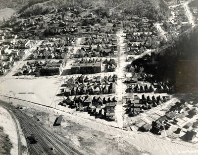 Looking southeast on flood waters running through streets of Wallace, Idaho.