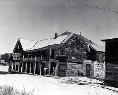 Idaho Hotel on Jordan Street and Wells-Fargo office on the right. Silver City, Idaho.
